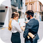 Professionals discussing land measurements
